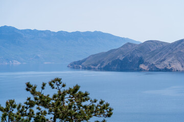 Prvić Island and Sveti Grgur, Croatia - April 20, 2025: Panoramic view of the mountains and sea.