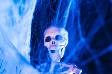 Halloween blue mystical creepy background. Spooky Halloween street decor.Halloween wallpaper with a...