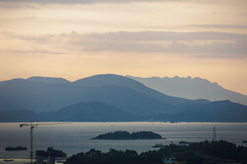 View of the harbor with many islands and ships at sunset, Yeosu, South Korea