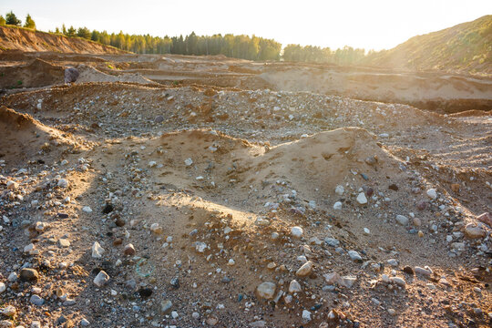 Sand and rocks at a depleted gravel quarry