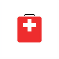 Obraz premium Red first aid kit box with a white cross symbol.