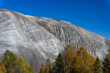 A mining wastes  mountain on a blue sky