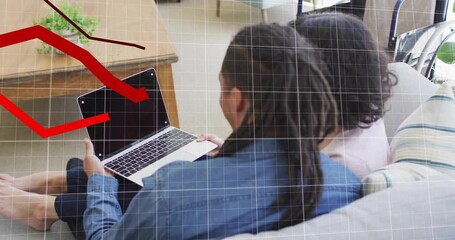 Man and woman lifting laptop, analyzing animated financial graph overlaying grid on sofa background - Powered by Adobe