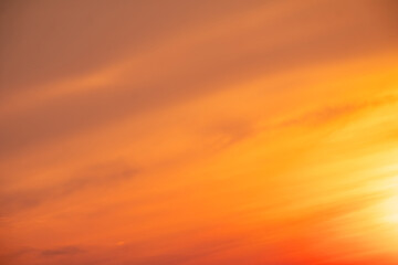 Fototapeta premium Beautiful , luxury soft gradient orange gold clouds and sunlight on the blue sky perfect for the background, take in evening,Twilight, Large size, high definition landscape photo