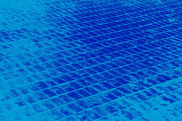 Abstract and geometric illustration in blue color with square shaped pattern. Textured illustration of a roof with row of square. Textured background.