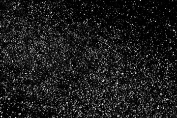 Black background with white droplets. Textured background in green and white particles. Abstract illustration and night sky illustration.