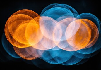 Glowing orange & blue circles overlap on dark background