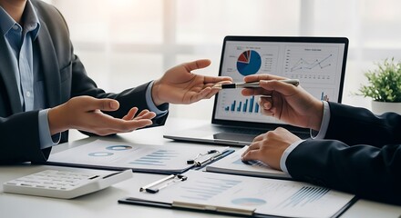 Strategic financial discussion between business partners, analyzing investment data and planning future growth in a corporate environment