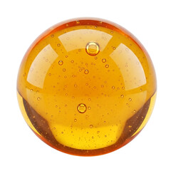 Close-up of a transparent, amber-colored glass sphere with internal bubbles, isolated on a white background.