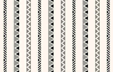 Ethnic tribal african black and white vertical stripe background. Seamless tribal pattern, folk embroidery,  geometric ornament. Traditional design for fabric, textile, rug, paper, carpet

