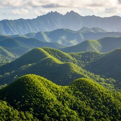 Verdant Hills and Distant Peaks - A Landscape of Natural Beauty.