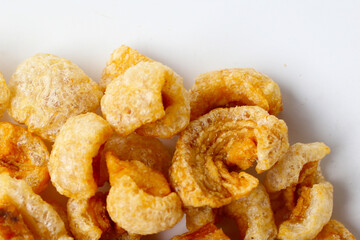 Crispy pork cracklings, a crunchy savory snack.