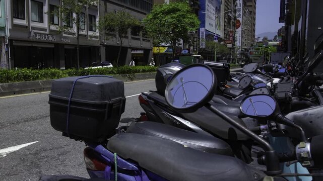 A timelapse of traffic jam near the scooter parking at Linsen N Rd in Taipei zoom