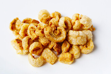 Crispy pork cracklings, a crunchy savory snack.