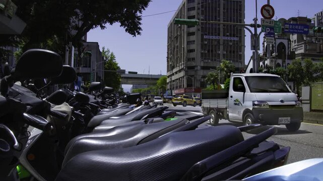 A timelapse of traffic jam near the scooter parking at Linsen N Rd in Taipei zoom