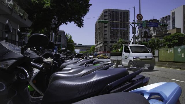 A timelapse of traffic jam near the scooter parking at Linsen N Rd in Taipei tilt
