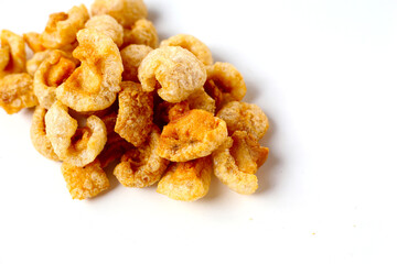 Crispy pork cracklings, a crunchy savory snack.