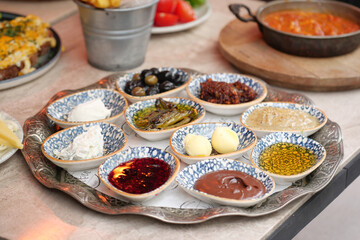 Delicious selection of dips served on a decorative tray