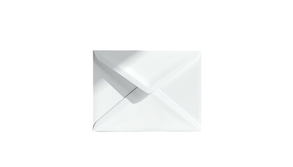 A white envelope sits center frame on a dark background, lit from above