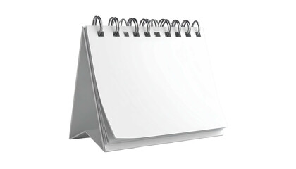 White desk calendar with spiral binding, standing on a black background