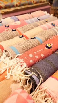 Rolled Turkish Towels with Evil Eye Beads