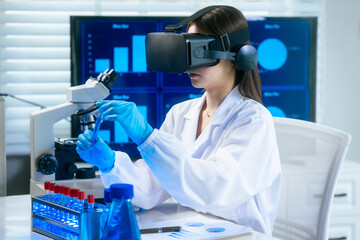 An Asian female scientist in a modern lab interacts with 3D holographic data using VR/MR headset, integrating microscopy, chemical analysis,computational biotechnology immersive, advanced scientific