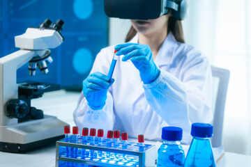 An Asian female scientist in a modern lab interacts with 3D holographic data using VR/MR headset, integrating microscopy, chemical analysis,computational biotechnology immersive, advanced scientific