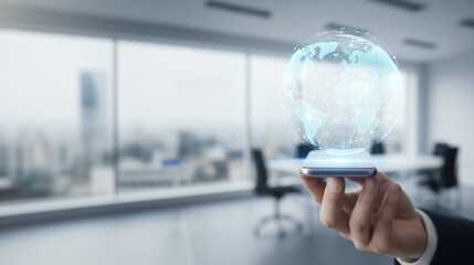 Hand holds a phone with a globe hovering over it. Perfect for tech or communication concepts, global business, travel apps or websites. Hand holding cellphone with hovering globe on screen.
