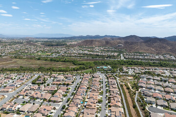 Aerial view of a sprawling neighborhood of family homes in Menifee city in Riverside County,...