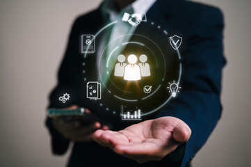 Businessman showcasing a platform for HR and Customer Relationship Management (CRM). The UI has icons for employee data, client analytics, business partnerships, and performance reports.