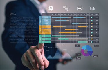 Project manager analyzing a business intelligence dashboard. The virtual interface shows a Gantt chart for project scheduling, data analytics graphs, and KPIs for performance tracking.