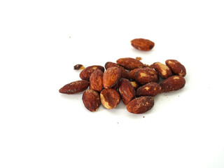 Close up Almonds bean on white background. Fruit bean for energy breakfast, brunch snack, and vegetarian. Healthy food contains antioxidants nutrients vitamins. Kernel Grains almond nutrition 