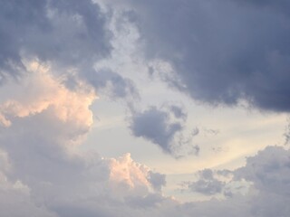 Soft grey and white clouds filled the sky, with a hint of pink in some places.