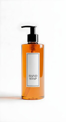 Minimalist Amber Hand Soap Dispenser Bottle with Blank Label on White Background.