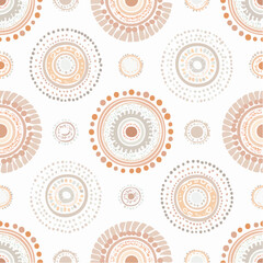 A seamless Indigenous Australian Dreamtime pattern with circular dot motifs in natural earthy tones. Perfect for textiles, packaging, and educational art.