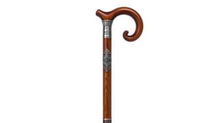 Ornate wooden walking stick isolated