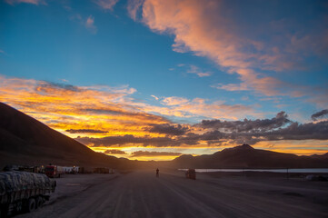 A vast road under a magnificent sunset