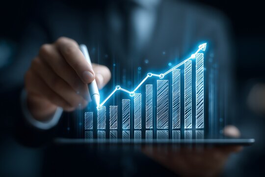 Businessman Drawing Glowing Growth Chart With Stylus On Tablet Screen Representing Financial Success And Increase