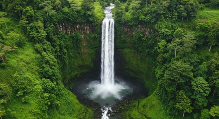 Spectacular Waterfall Flowing Into Tropical Rainforest Paradise