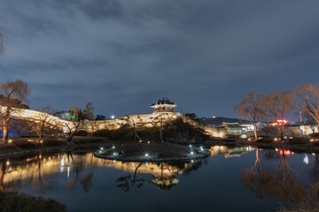 Captured this serene view of Hwaseong Fortress' Banghwasuryujeong in March. The calm pond and traditional architecture shine under the dark sky with a great reflection.