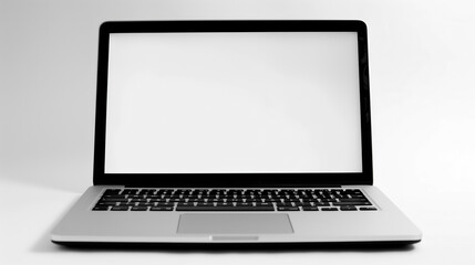 Fototapeta premium Laptop and Blank Screen: A modern laptop sits open, its screen displaying a blank canvas, ready for any creative endeavor or communication.