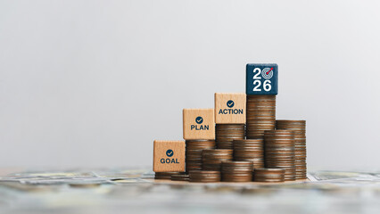 New Year 2026 concept wooden blocks with text Goals, Action Planning, Financial Plans and...