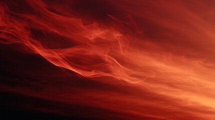 A dramatic, swirling display of red and orange hues in the sky, resembling flames, evoking a sense of movement and intensity.