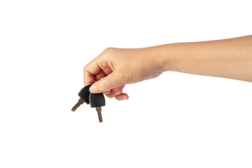 Black locker key in hand on transparent background