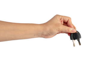 Black locker key in hand on transparent background