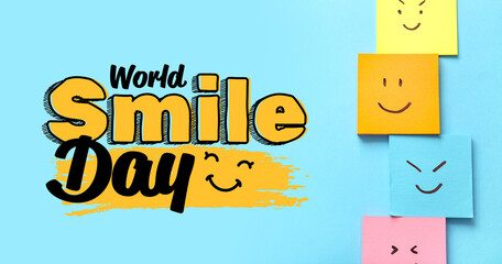 Sticky papers with drawn happy faces on blue background. World Smile Day