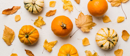 Autumn composition. Pattern made of dried leaves and other design accessories on table. Flat lay,...