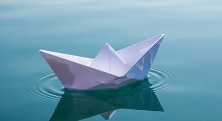 Serene paper vessel drifting on calming turquoise water surface