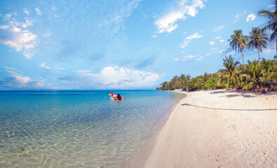 The magnificent white sand and turquoise waters of the Matira public beach on the island of Bora Bora, French Polynesia, South Pacific Ocean