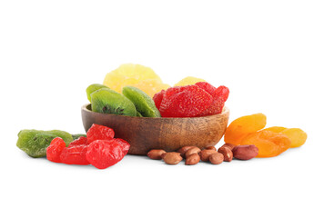 Wooden bowl with different candied fruits and peanuts on white background